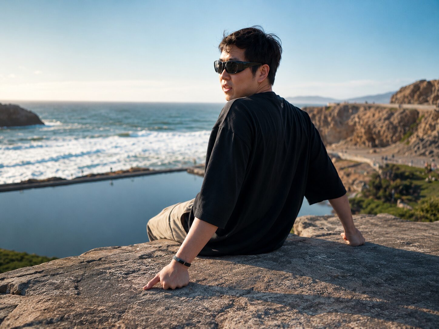 Andy Kong, founder of Chargerless, wearing Ray outdoors