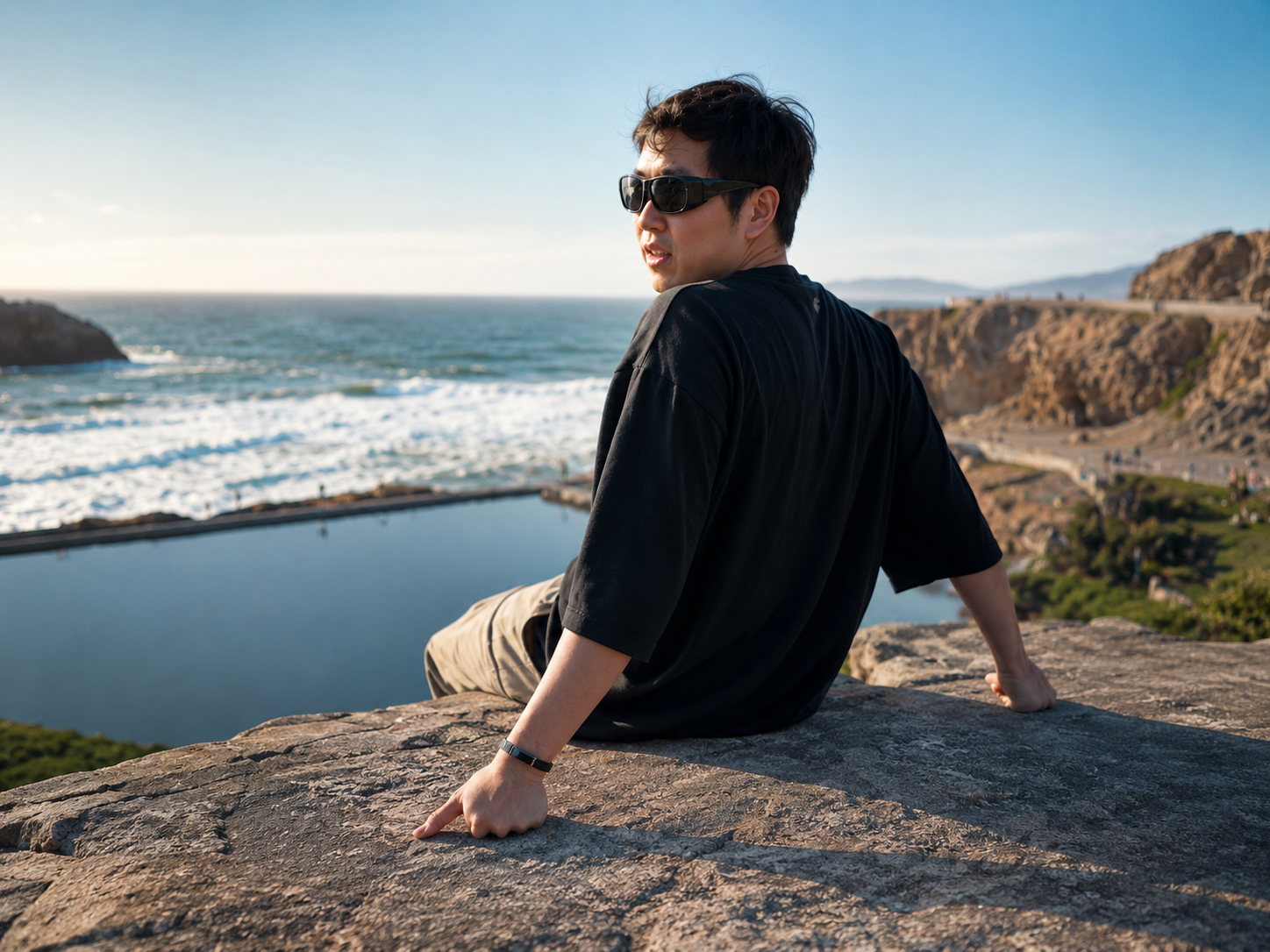 Andy Kong, founder of Chargerless, wearing Ray outdoors